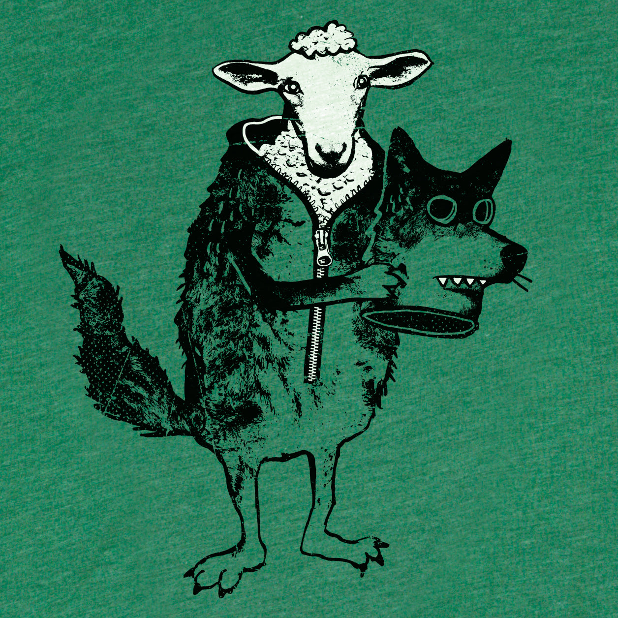 Detail of super soft green mens/womens tshirt of a sheep wearing a wolf's costume. Factory 43 is a graphic design studio that makes art with a PNW vibe that reflects their Midwest/Southern roots. This cotton/polyester/rayon shirt printed in Seattle, Washington.